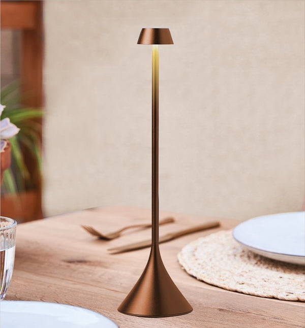 Bonherre mağazasından Lexon Steli Shade, bronz alüminyum gövdeli, senkronize edilebilir, 9 renkli ve kablosuz şarjlı LED masa lambası.