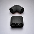 Bonherre mağazasından Lexon Ray, mat siyah alüminyum gövdeli, manyetik ve su geçirmez Bluetooth hoparlör.