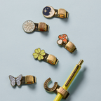 Bonherre mağazasından Designworks Ink marka, kelebek ve mantar tasarımlı 2'li kitap kalem klipsi.