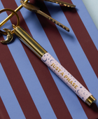 Bonherre mağazasından Designworks Ink marka, Just a Phase temalı kalem anahtarlık.