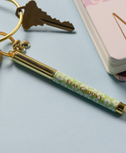 Bonherre mağazasından Designworks Ink marka, Stay Groovy temalı kalem anahtarlık.