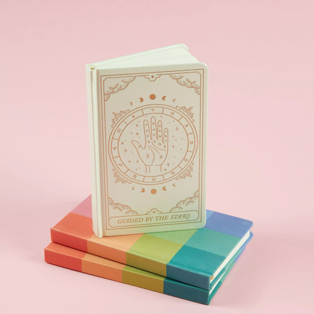 Bonherre mağazasından Designworks Ink marka, zodyak desenli kırık beyaz sert kapak defter.
