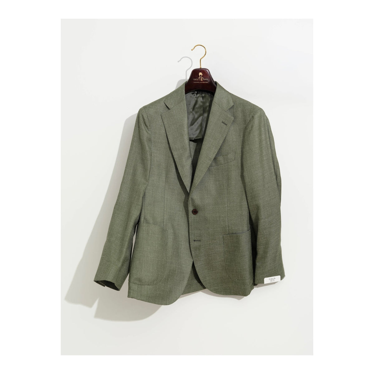 Bonherre mağazasından Borriello X Enis İnci yeşil blazer ceket, askıda tam ürün görünümü.
