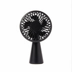 Bonherre mağazasından Lexon Wino Siyah, alüminyum saplı, 3 kademeli hız ayarlı, kablosuz indüksiyon şarj özellikli lüks taşınabilir mini fan.