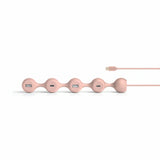 Bonherre mağazasından Lexon Peas Hub C, pembe silikon gövdeli, 2 USB-C ve 2 USB-A girişli lüks esnek USB çoklayıcı.