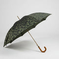 Bonherre mağazasından Pasotti Pelle Dol Arancio Militare, kamuflaj desenli ve turuncu deri saplı lüks İtalyan katlanır şemsiye.